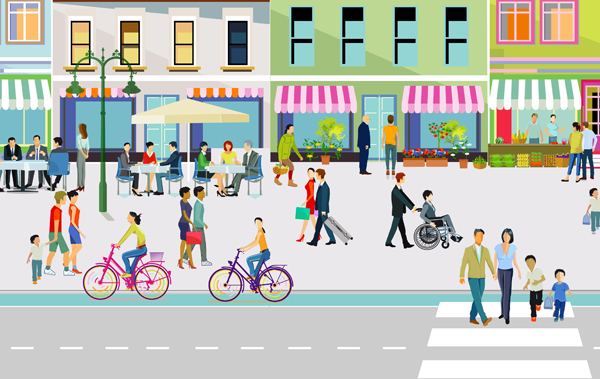 Symbolbild Bevölkerungsentwicklung: Belebter Straßenzug mit Menschen. Häusern und Außengastronomie
