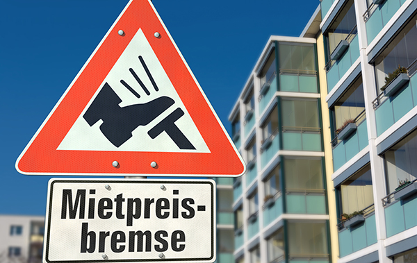 Symbolbild Mietpreisbremse: Warnschild